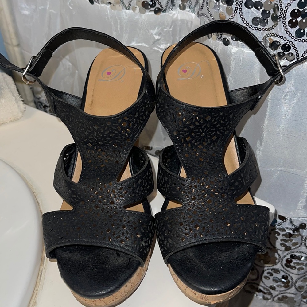 Black wedges open to offers